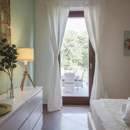 Orchidea E Glicine سوماكامبانا